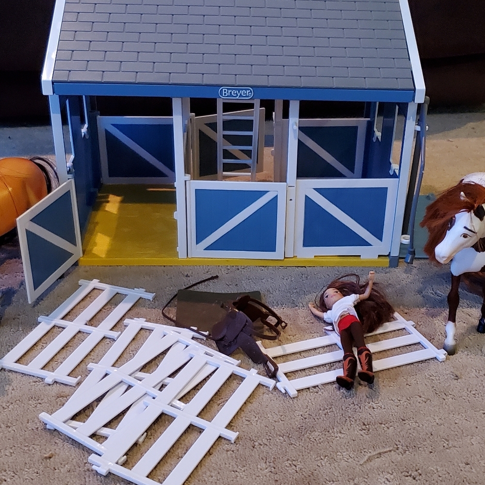 Breyer stable, horses, and one girl